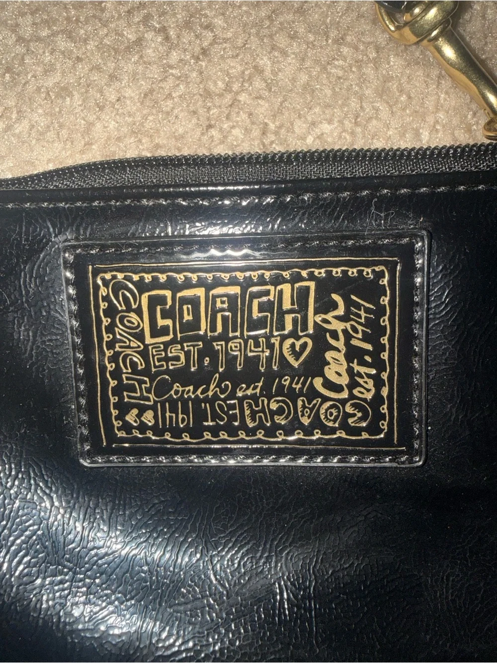 Coach Black Leather Wristlet with Gold Patch